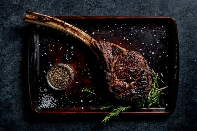 Food photography of tomahawk steak
